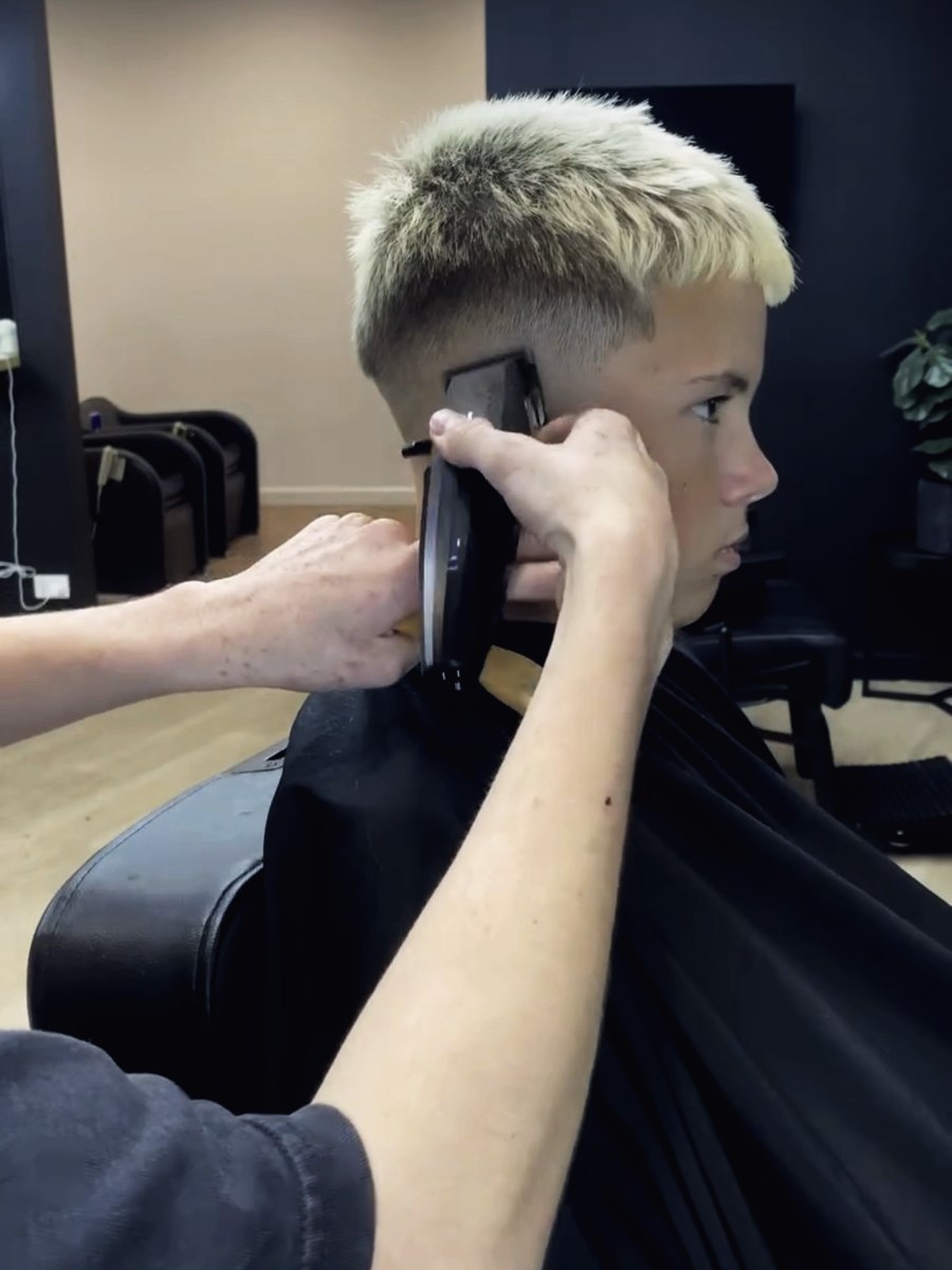 A fade being clipped in close to the skin